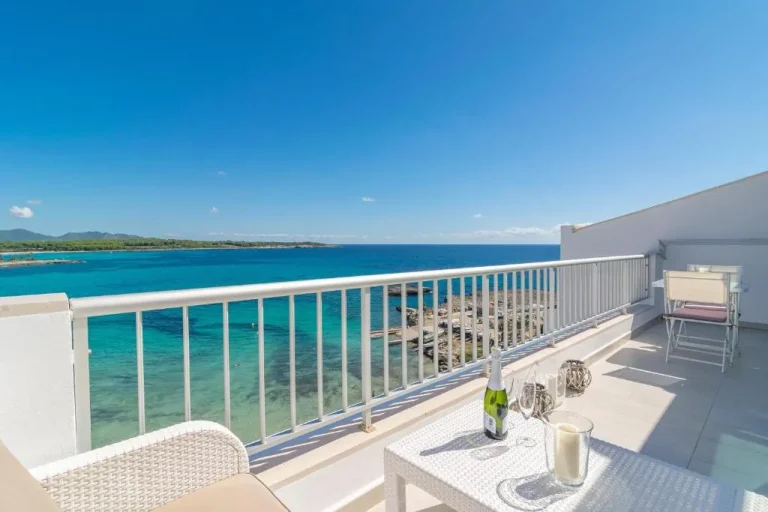 Luxury balcony overlooking the turquoise Mediterranean sea in Turkey, representing property management and holiday rental homes